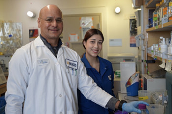 Jazmin with lead PI Oviedo working together in the lab.