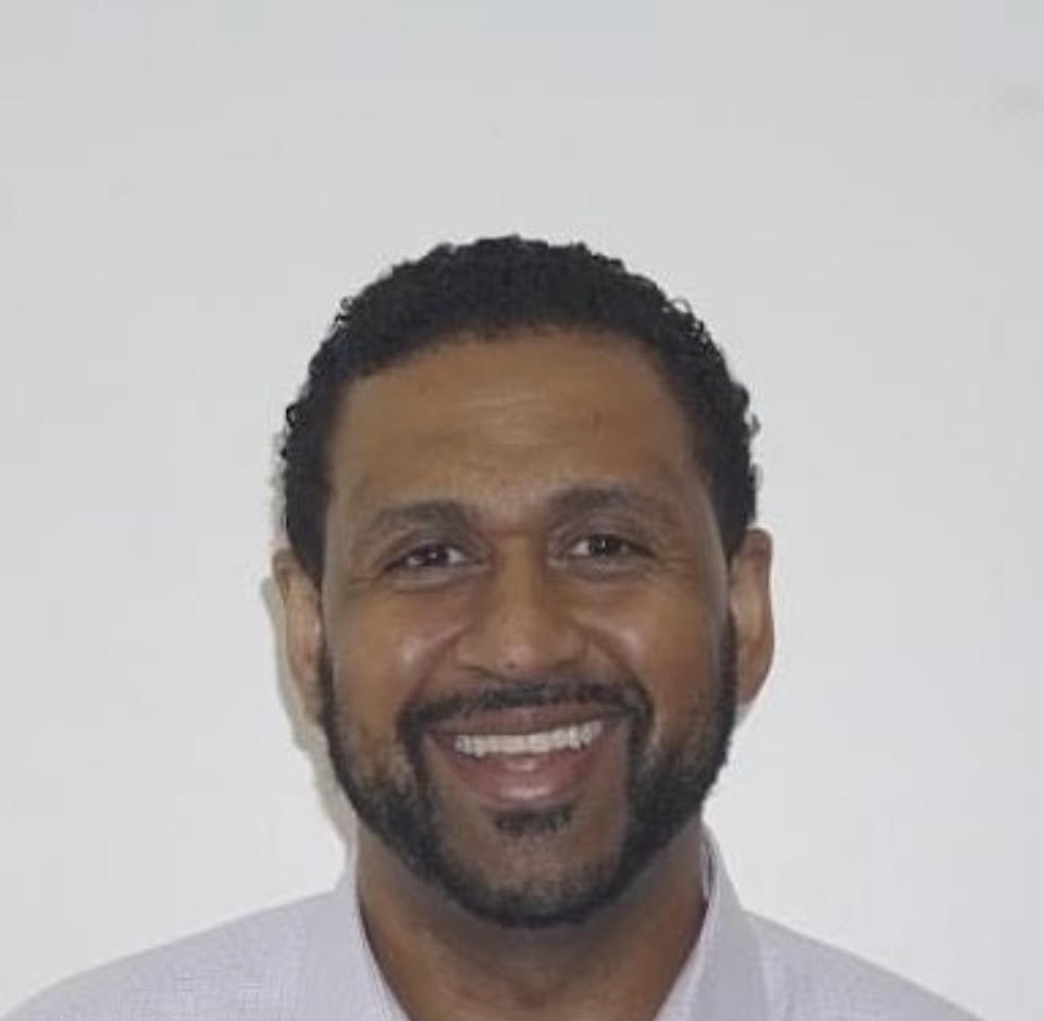 Headshot of Andrew W. Houston